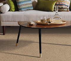 Family playing games in a living room with a hardwood floor