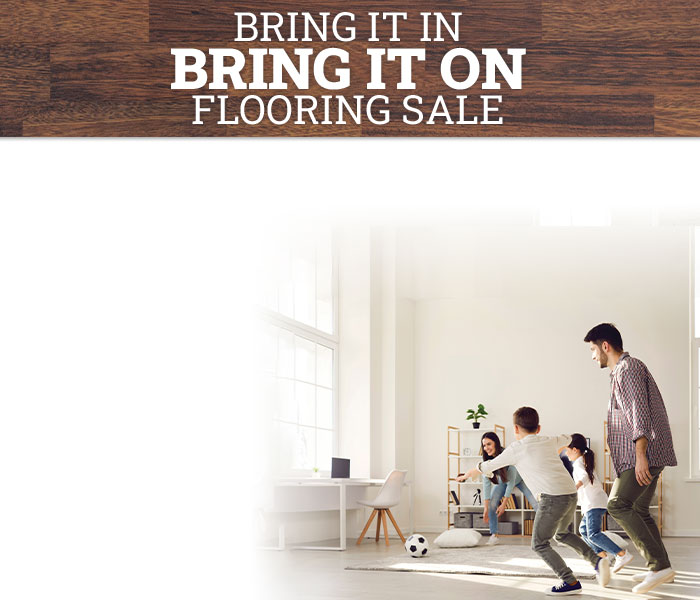 Mom and daughter playing with tablet on hard surface floors
